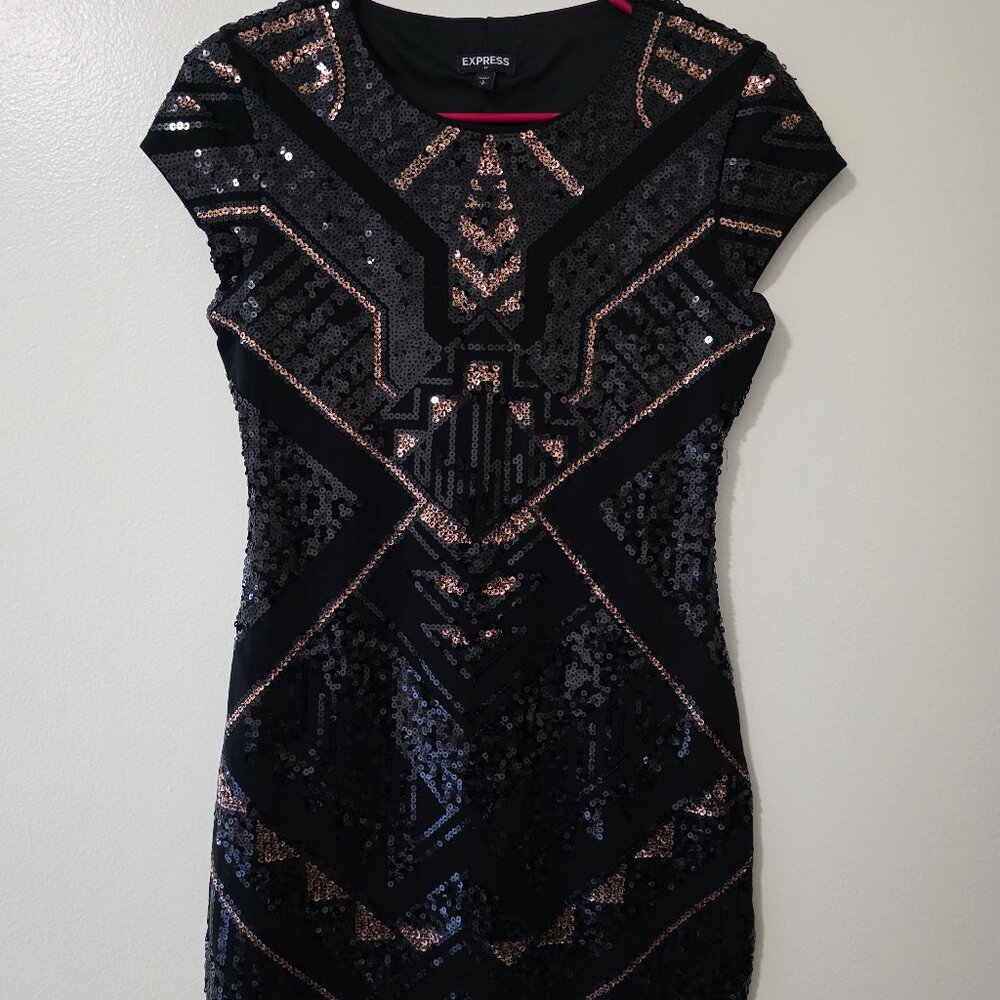 Black and gold sequin dress